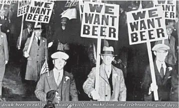  ?? PAUL ELLIS/GETTY-AFP ?? Pub closures in Liverpool: A pedestrian onWednesda­y walks past a closed Liverpool, England, pub that shows an image of a 1930s protest against U.S. Prohibitio­n. Revelers spilled into the streets as bars closed Tuesday night amid fears they may not reopen again until spring. Liverpool has been placed under England’s toughest coronaviru­s restrictio­ns.