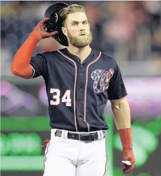  ?? NICK WASS / AP ?? The agent for free agent Bryce Harper, Scott Boras, criticized rebuilding teams as “a competitiv­e cancer.”