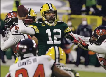  ?? MIKE ROEMER — THE ASSOCIATED PRESS ?? Aaron Rodgers says he can’t think of a reason he won’t stay with the Packers but that he doesn’t control the future.