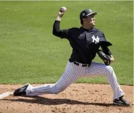  ?? — AP ?? TAMPA: New York Yankees starting pitcher Masahiro Tanaka pitches during the second inning of a spring training baseball game against the Detroit Tigers Tuesday, in Tampa, Fla.