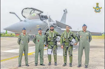  ?? PTI ?? Air Chief Marshal RKS Bhadauria with Rafale pilots at the Air Force Station in Ambala on Wednesday.