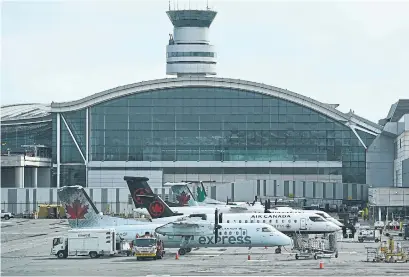  ?? NATHAN DENETTE THE CANADIAN PRESS FILE PHOTO ?? Effective Jan. 11, Air Canada says it will suspend flights in Sydney, N.S., and Saint John, N.B. Other routes will be temporaril­y halted.