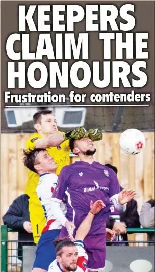  ??  ?? HANDS OFF: Dorking’s Slav Huk punches clear against Bath City