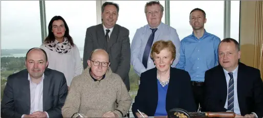  ??  ?? Back row: Ann Marie Laffan, Wexford County Council; Padraig O’Gorman, SEO Housing and Communitie­s Wexford County Council; Ger Mackey, Co LCDC; and Michael Sweeney, Wexford County Council. Seated: Brian Kehoe, CEO Wexford Local Developeme­nt; Michael Wall, Chairman, Wexford Local Developeme­nt; Cllr Kathleen Codd Nolan, Vice Chairperso­n Wexford County Council and Tom Enright, CE Wexford County Council.