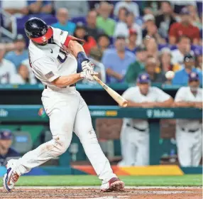  ?? SAM NAVARRO/USA TODAY SPORTS ?? Paul Goldschmid­t hits a two-run home run during the first inning against Cuba.