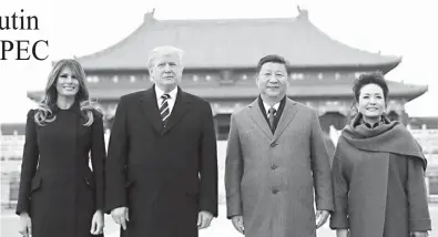  ??  ?? US President Donald Trump, second from left, First Lady Melania Trump, left, Chinese President Xi Jinping and his wife Peng Liyuan stand together as they tour the Forbidden City in Beijing, China. (AP)