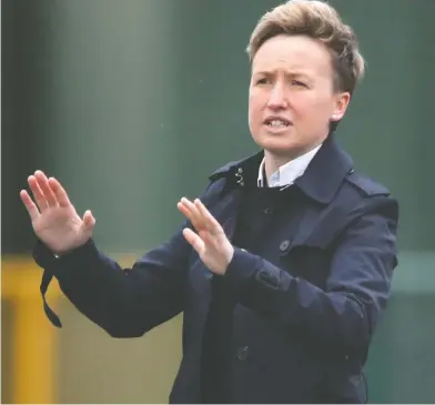  ?? NICK POTTS / PA VIA THE ASSOCIATED PRESS ?? Canada head coach Bev Priestman —above gesturing on the touchline at a women's internatio­nal friendly against
Wales — says her team's Olympic Games draw is “a relatively tough group.”