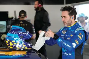  ?? (AP Photo/john Raoux) ?? Jimmie Johnson prepares himself before the start of a practice session for the NASCAR Daytona 500 auto race at Daytona Internatio­nal Speedway, Saturday, Feb. 18, 2023, in Daytona Beach, Fla.