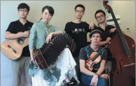  ?? ZOU HONG / CHINA DAILY ?? Tango Libertad band features Liu Shanshan, Spanish violinist Daniel Hurtado and three Chinese musicians: guitarist Zhang Wei, pianist Hui Dui and double-bass player Hu Jun.