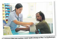  ?? SECURITYTY OFFICE PHOTOS BY THE NATIONAL HEALTH ?? basic health checkup at Moo 7 in Phatthalun­g’s An indigenous Mani man ma receives aThung Naree district.