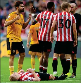  ?? ?? OFF DAY: Costa (left) saw red after VAR told ref Madley he had head-butted Mee