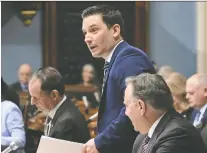  ?? JACQUES BOISSINOT/THE CANADIAN PRESS FILES ?? Quebec Justice Minister Simon Jolin-barrette says the government has been working on legislatio­n to protect consumers “for a while now.”