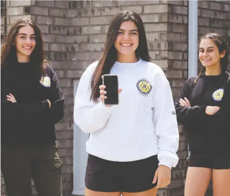  ?? DAN JANISSE ?? Stephanie Paulose, left, Isabella Gallucci and Sofia Dimario, shown on Thursday, have started an online petition to save their high school graduation ceremony. They are asking the school board to allow a proper celebratio­n whenever it is deemed safe to do so.