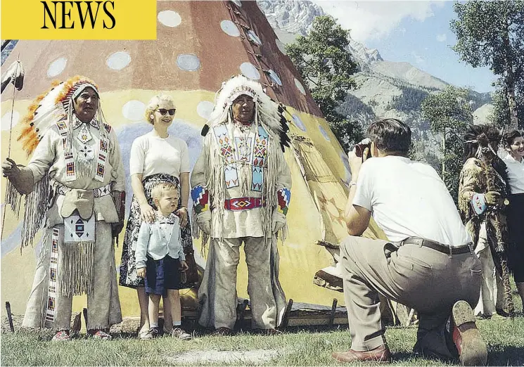  ?? ARCHIVES CANADA ?? A family takes part in the annual Banff Indian Days in 1957 in Banff National Park. Stoney band members were invited back to the land they once managed to entertain tourists until the event ended in the 1970s. Across Canada, Indigenous people were banished from lands they once lived on to clear the way for parkland.