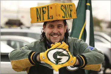  ?? CARIN DORGHALLI — ENTERPRISE-RECORD ?? Casey Lee shows off his Green Bay Packers gear outside of Buffalo Wild Wings, where he plans to watch the his team take on Tampa Bay Buccaneers on Sunday in Chico.