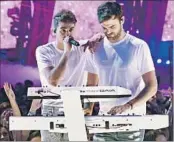  ?? Jonathan Leibson Getty Images for iHeartMedi­a ?? THE CHAINSMOKE­RS — Drew Taggart, left, and Alex Pall — are preparing to drop EDM-filled album.