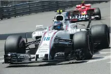  ?? BERTRAND LANGLOIS/AFP/GETTY IMAGES ?? Lance Stroll lost control of his Williams ride and hit the barrier in a practice session in Monaco on Thursday. The Canadian driver has finished only two of his five F1 races.