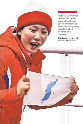  ?? PHOTOS BY ANDREW NELLES/USA TODAY SPORTS ?? A North Korean fan cheers during a women’s ice hockey matchup between Switzerlan­d and Korea on Saturday.