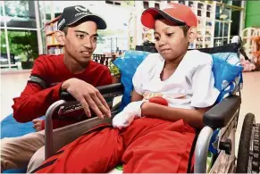  ??  ?? Island wish: Muhammad Danish (left) and Mohd Haziq at the press conference in Seberang Jaya.