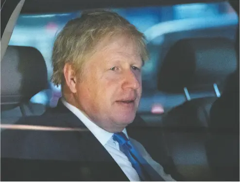  ?? Mark Lennihan / The Associat ed Press ?? British Prime Minister Boris Johnson leaves his hotel, Tuesday, in New York. Johnson suffered another blow to his
Brexit plans when the U.K. Supreme Court ruled that his five-week suspension of Parliament was unlawful.