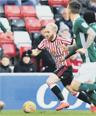  ??  ?? Sunderland substitute Jonny Williams takes on the Brentford defence at the Stadium of Light on Saturday,