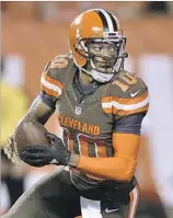  ?? David Richard Associated Press ?? CLEVELAND hopes new quarterbac­k Robert Griffin III, left, can energize a long-dormant offense. New England will open with Jimmy Garoppolo, right, in place of the suspended Tom Brady.