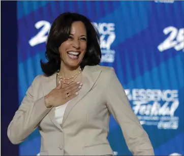  ?? GERALD HERBERT — THE ASSOCIATED PRESS ?? Democratic presidenti­al candidate, Sen. Kamala Harris arrives to speak at the Essence Festival on Saturday.