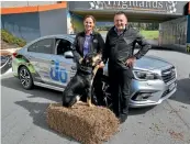  ??  ?? Federated Farmers national president Katie Milne and Subaru NZ boss Wally Dumper with one of the ‘‘do’’ cars.