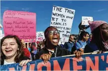  ?? Doug Strickland / Chattanoog­a Times via AP ?? Demonstrat­ors in the Chattanoog­a Women’s March joined those in more than 200 events Saturday.