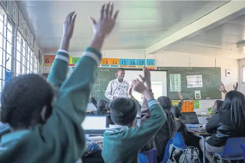  ??  ?? Teacher Chamu Mawiri leads the Robotics and Coding Club Meeting at the Sedi-Laka Primary School, in Ivory Park, Johannesbu­rg, on Sept 12.