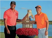  ?? MIKE EHRMANN/GETTY IMAGES ?? Tiger Woods and tournament winner Rickie Fowler after the Hero World Challenge at Albany, Bahamas.