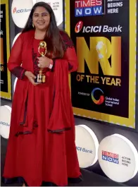  ?? Supplied photo ?? Simran Vedvyas with her NRI of the Year Award (academics category) trophy. —