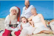  ?? Picture: NATURALLY CREATIVE ?? Paige’s family with Santa.