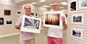  ?? ?? Exhibition organisers Mark Russell and Rod Bird at the Maidenhead Camera Club display in the Nicholsons Centre. Ref:134758-1