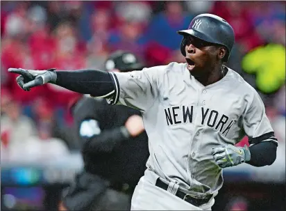  ?? DAVID DERMER/AP PHOTO ?? Didi Gregorius of the Yankees points to the dugout after hitting a two-run home run off Indians starting pitcher Corey Kluber during the third inning of Game 5 of the ALDS on Wednesday night. Gregorius homered twice as the Yankees won 5-2.