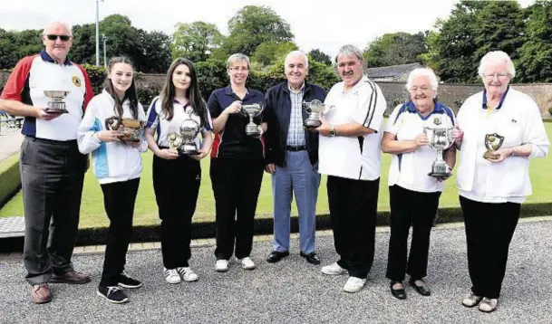  ?? Photograph: Jim Irvine ?? WINNERS ALL: Sport Aberdeen’s Fred Dalgarno, fifth left, with City of Aberdeen bowling tournament winners, from left, Jim Forbes, Lucy Willox, Emma Reid, Sandra Dean, Frankie Stevenson, Kate Cairns and Isobel Bremner.