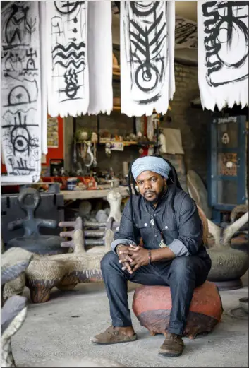  ?? ADRIAAN LOUW VIA THE NEW YORK TIMES ?? Ceramics artist Andile Dyalvane in Cape Town, South Africa. Dyalvane is known for pieces that honor his Xhosa heritage.