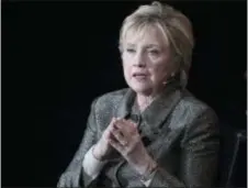  ?? MARY ALTAFFER ‑ THE ASSOCIATED PRESS ?? In this April 6 photo, former Secretary of State Hillary Clinton speaks in New York. Half a year after her stunning loss to Donald Trump in November 2016, a loss that left her devastated and heartbroke­n, those close to her say, she has professed...