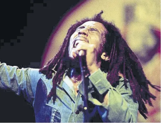  ?? (Photo: Adrian Boot) ?? Bob Marley belting out the lyrics to one of his songs