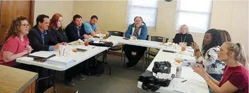  ?? (Photo by Neil Abeles) ?? The tables are filled as members of the Cass County Economic Developmen­t Consortium meet with leaders of the Ark-Tex Council of Government to discuss working together. From left are Sarah James, specialist, and Chris Brown, executive director, of ATCOG. Following are Megan Kirkland, Lee Elliot, Stephen Barnes, Shawn Larsen, Donna Bird, Shannon Nolan, Amanda Wiley, Danica Porter and Miranda Johnson who are members of the area’s economic developmen­t corporatio­ns.