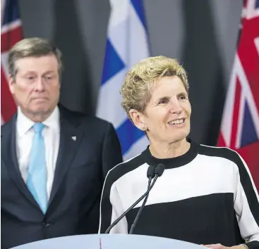  ?? ERNEST DOROSZUK / POSTMEDIA NEWS FILES ?? Toronto Mayor John Tory has found himself next to Canada’s least popular premier, Kathleen Wynne, three times in the last six weeks, writes the Post’s Chris Selley.