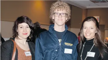  ??  ?? Dalyce McElhinney, left, Robert Gray and Isabelle Colmers at the Edmonton Public Schools Foundation’s Ready to Frame fundraiser at the Chateau Nova Kingsway on Thursday.