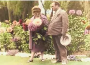  ?? COURTESY CENTER FOR SOUTHWEST RESEARCH/UNM NEW MEXICO ?? Gov. Clyde Tingley and his wife, Carrie, in the garden at the executive mansion in Santa Fe.