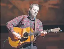  ?? Dimitrios Kambouris Getty Images for Tibet House ?? STURGILL SIMPSON, shown performing in New York City last month, brings his hardened country songs to Coachella.