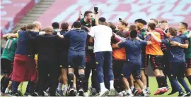  ??  ?? Aston Villa players celebrate