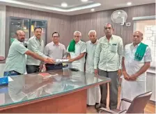  ?? ?? Members of farmers associatio­ns with the Chief Engineer (third from left) of the Water Resources Department in Coimbatore on Monday.