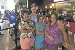  ?? COURTESY PHOTOS ?? Food, food, food, (from the back, left to right) Beverly Exline of Washington, Kathy Atkins of Browntown, Lisa Streightif­f of Amissville, and Jeanette Brady of Front Royal wait in line for a vacation meal.