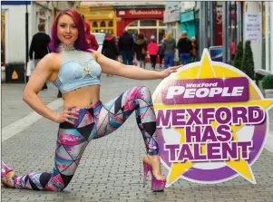  ??  ?? Former finalist Danielle Reck helps promote Wexford Has Talent on the Main Street.