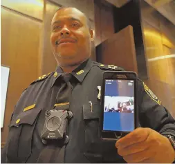  ?? STAFF FILE PHOTO, ABOVE, BY NANCY LANE; STAFF PHOTO, BELOW, BY STUART CAHILL ?? PHOTO OP: Boston police Superinten­dent-in-Chief William G. Gross, above, demonstrat­es a body camera in 2016. Below, Mayor Martin J. Walsh is under fire by an activist group that wants no further delay in the camera implementa­tion.