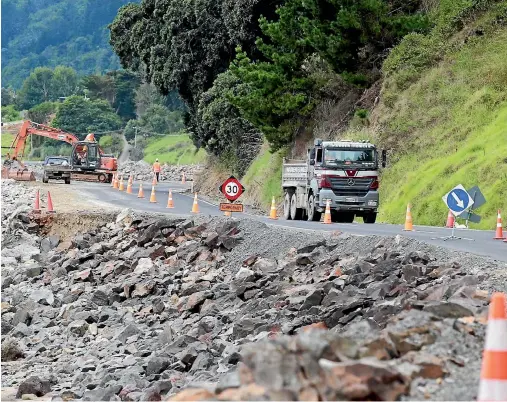  ?? PHOTO: KELLY HODEL / STUFF ?? Work on State Highway 25 is going to take longer than expected after storms in January hit the coastal road.